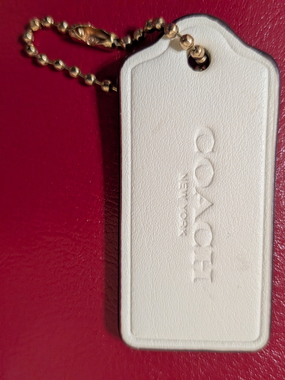 Coach Off White/Cream Leather Bag Tag with Gold Ball Chain